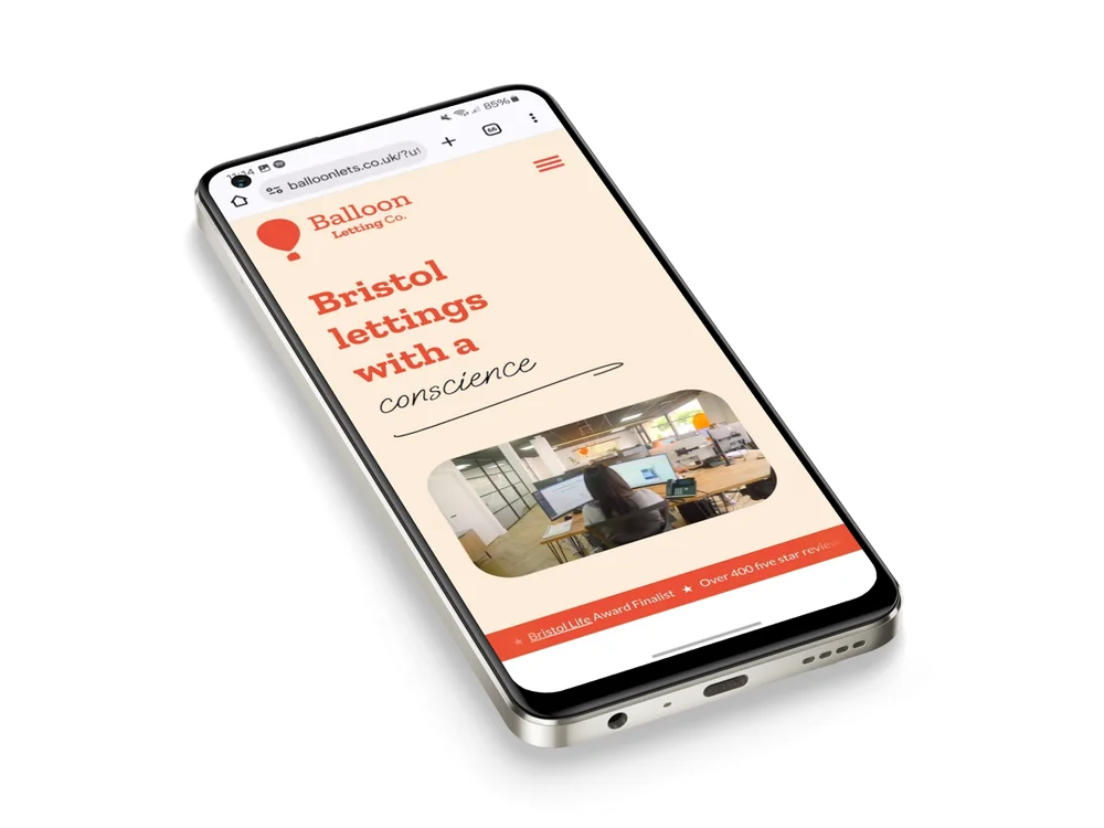 Balloon Lets homepage 'Bristol lettings with a conscience' shown on a smartphone